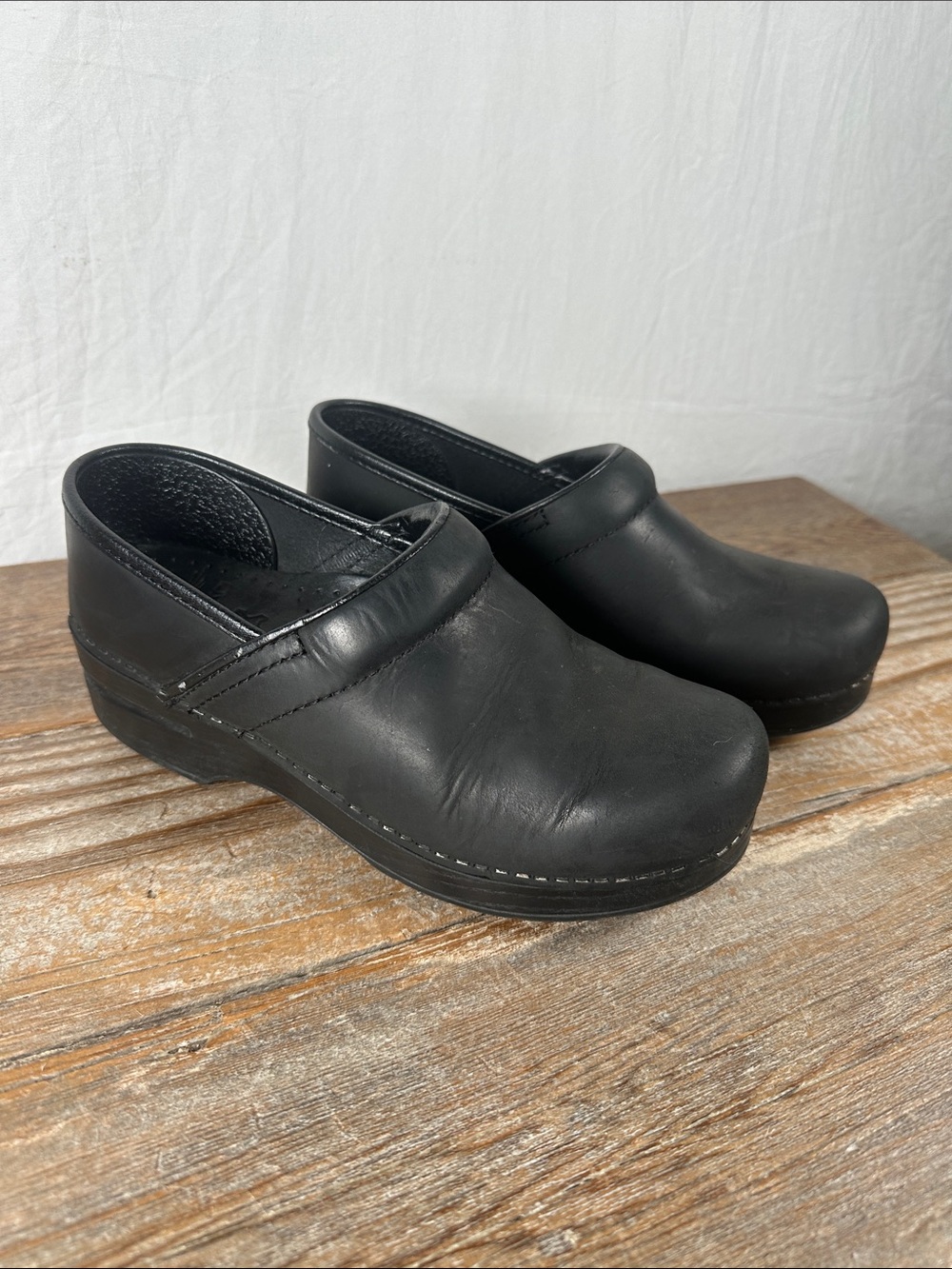 Dansko Black Leather Professional Slip-On Clogs